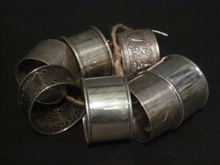 6 silver napkin rings 3 1/2 ozs and an Eastern napkin ring