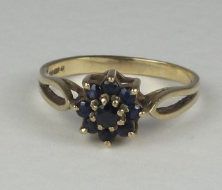 A 9ct gold dress ring set sapphires