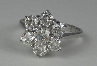 A lady's 18ct white gold floral cluster dress ring set diamonds, approx 2.25ct
