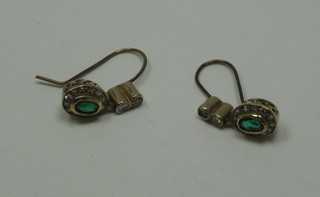 A pair of emerald and diamond drop earrings, approx 0.4/0.50ct
