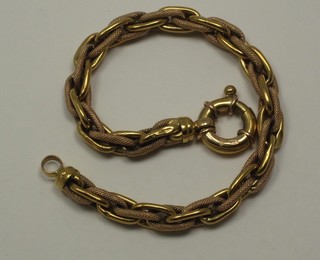 A hollow gilt metal multi link bracelet