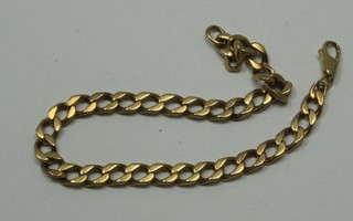 A modern gold flat link bracelet