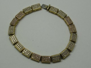 An 18ct gold box link bracelet set diamonds