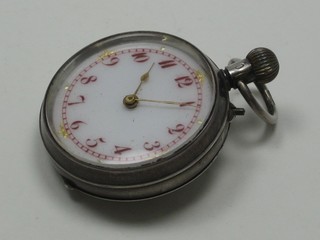 An open faced fob watch contained in a Continental silver case with enamelled dial