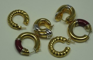 3 pairs of gilt metal earrings