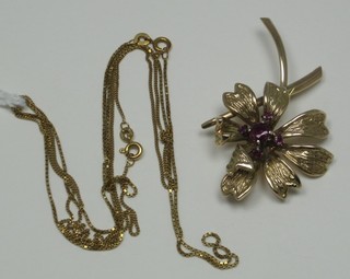 2 gold fine link chains together with a 9ct gold floral set brooch