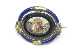 A 19th Century micro mosaic oval brooch of a temple