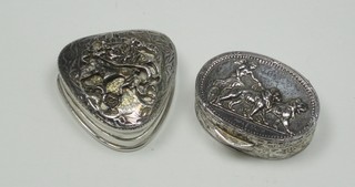 A small heart shaped silver box 1" and an oval silver box 1 1/2"