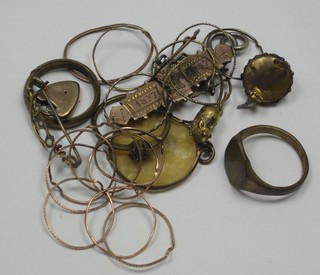 A collection of gilt metal earrings and costume jewellery