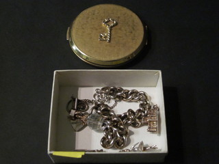 A gilt metal compact and a small collection of costume jewellery