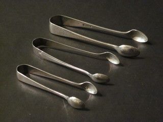 3 pairs of silver sugar tongs, 2 ozs