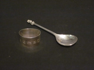 A 17th Century style silver preserve spoon with 1977 Silver Jubilee hallmark, together with a Silver Jubilee napkin ring 2 ozs