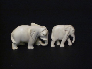 2 carved ivory figures of elephants, 3" and 2 "