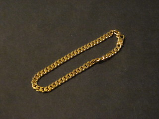 A gilt metal bracelet