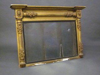A Regency rectangular plate over mantel mirror contained in a  gilt frame with column decoration to the side 44"