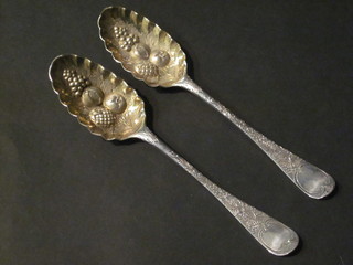 A pair of antique silver bottom marked berry spoons 3 1/2 ozs