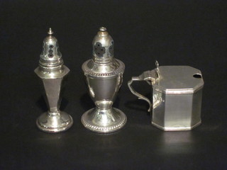 A square silver mustard pot with hinged lid, no liner,  Birmingham 1924 and 2 Sterling pepperettes