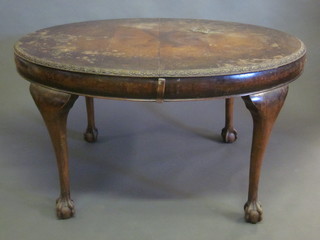 A Queen Anne style walnut oval extending dining table, raised  on cabriole, ball and claw supports, 53", some water damage