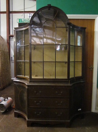 A handsome Edwardian Georgian style mahogany display cabinet  on chest, the arch shaped upper section of serpentine outline, the  base fitted 3 long drawers flanked by a pair of concaved panelled  doors, raised on bracket feet 54"