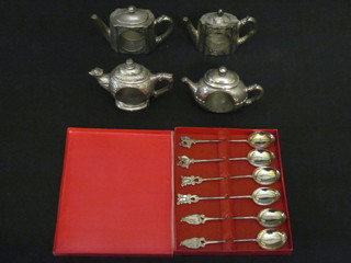 4 silver plated napkin rings in the form of teapots together with a set of 6 Eastern coffee spoons