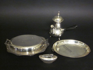 A silver plated side handled coffee pot, an entree dish and cover and a table lighter