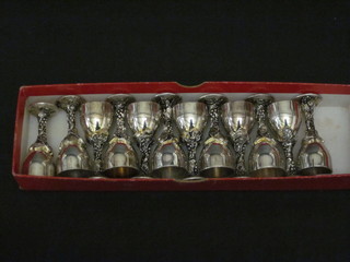 12 various silver plated menu card holders in the form of goblets