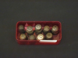 4 silver thimbles and 5 others