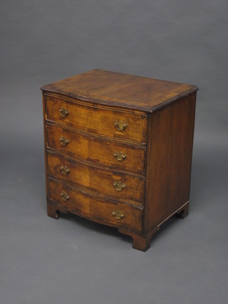 A Georgian style walnut chest of serpentine outline with crossbanded top, fitted 4 long drawers, raised on bracket feet 24"