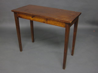 A 19th Century rectangular mahogany side table, raised on square tapering supports 35"