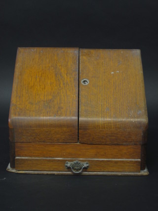 A Victorian oak stationery box with fitted interior and hinged lid  12"
