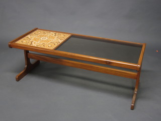 A 1960's rectangular teak and plate glass coffee table 48"