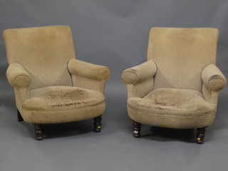 A pair of Victorian mahogany framed armchairs