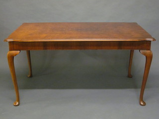 A Queen Anne style rectangular walnut library table, raised on cabriole supports 57"
