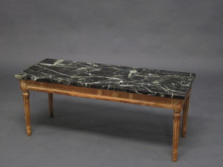 A rectangular Georgian style limed oak table with green veined marble top, raised on turned and fluted supports 36"