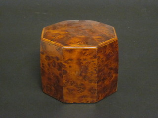 An octagonal figured walnut tea caddy with hinged lid 4 1/2"