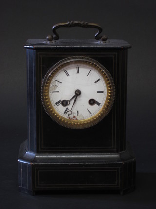 A French 19th Century 8 day mantel clock with enamelled dial  and Roman numerals contained in an ebony case  ILLUSTRATED
