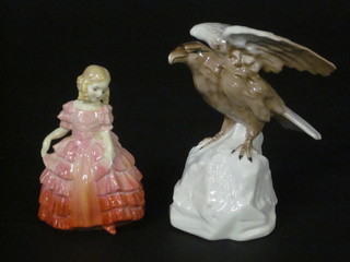 A Royal Doulton figure - Rose HN1368, head f, together with a  pottery figure of an eagle 6"