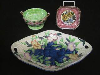 A Malingware green glazed twin handled bowl 4", a Malingware  Rosine pattern dish 4" and a Malingware boat shaped dish 12"
