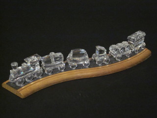 A Swarovski crystal locomotive together with 5 items of rolling stock and track