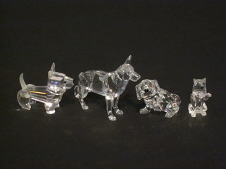 4 Swarovski crystal figures of dogs