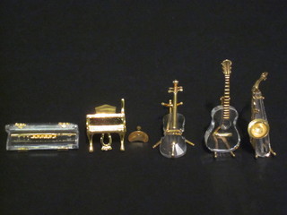 5 Swarovski crystal Memory figures in the form of musical instruments, boxed