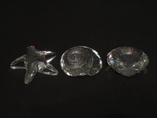 4 Swarovski crystal figures - ammonite, scallop shell and a star fish