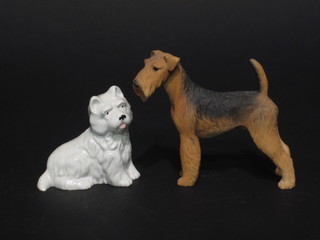 A Wade figure of a West Highland Terrier marked Scattel 1996  3" and a figure of a Airedale Terrier 4"