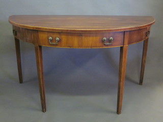 An 18th/19th Century mahogany demi-lune side table fitted a  drawer, raised on square tapering supports 68"