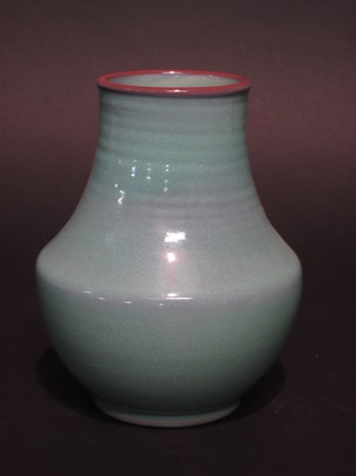 A circular Celadon Poole Pottery vase incised Poole England 203  8"  ILLUSTRATED
