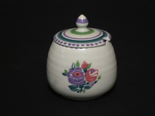 A circular Poole Pottery preserve jar and cover with floral  decoration, based incised Poole England 288 3"