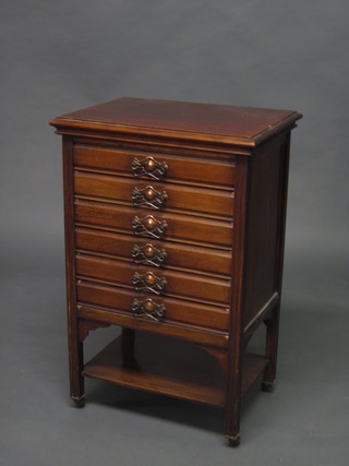 An Edwardian walnut music chest of 6 long drawers with  undertier 20"