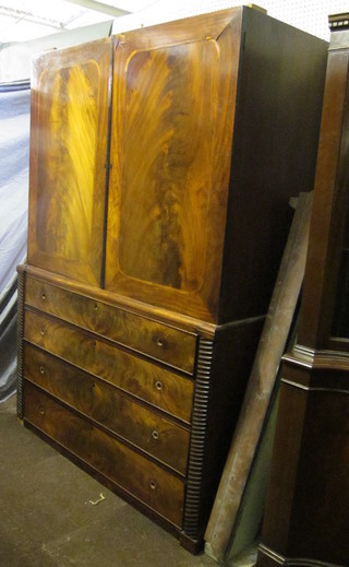 A 19th Century mahogany linen press, with part cornice, the  upper section fitted 2 trays, the base fitted 4 long drawers 51"