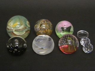 A collection of paperweights