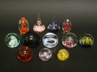12 various glass paperweights